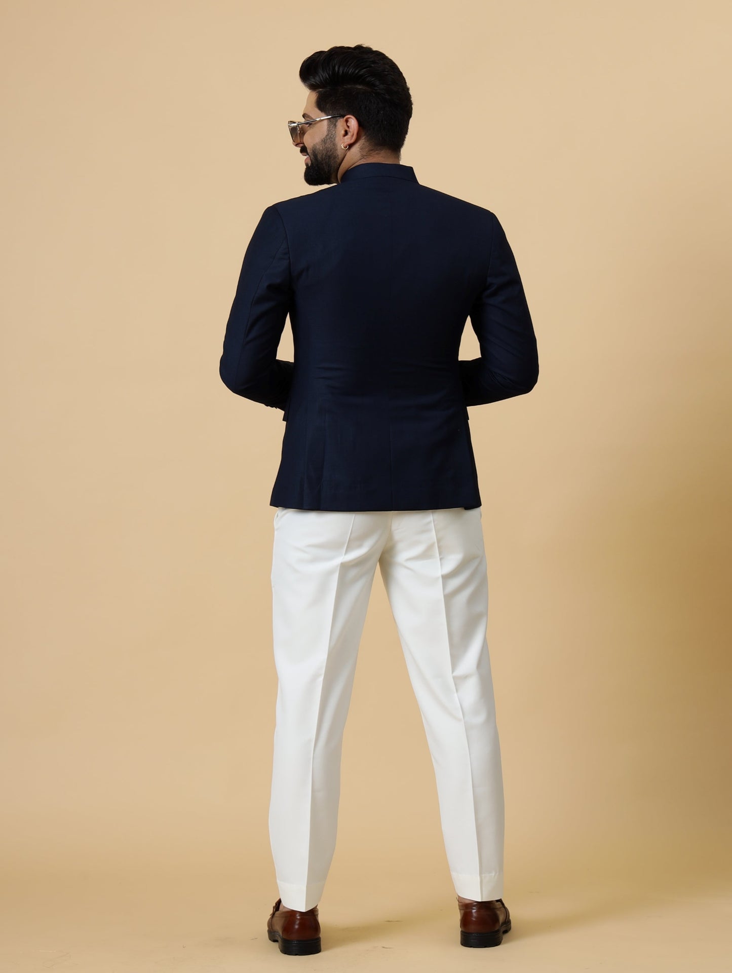 Alluring Navy Blue Pleated Jodhpuri Bandhgala with embroidered Patch | White Trouser